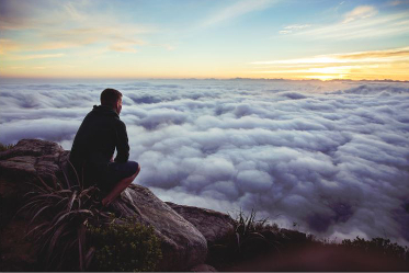 man staring into the clouds man staring into the clouds